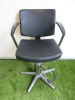 Professional Height Adjustable Barbers Chair on Chrome Base in Black PVC.
