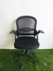 Black Mesh Back Office Swivel Chair with Fold Up Arms.
