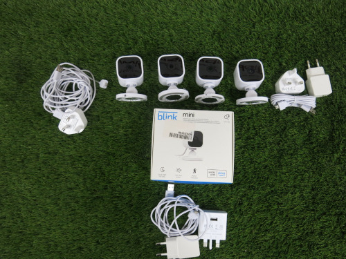 4 x Blink Mini Indoor Plug In HD Smart Security Camera. Comes with 3 x Power Supplies.