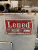 Lened Hydraulic & High Pressure Steam Vinyl Record Press. Complete unit with Lened Plastic Injection and Controls. Circa 1960's, S/N on Injection M/C Reads 79391. NOTE: buyer is responsible for stripping & removing at there own expense. - 2