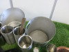 Lot of Assorted Bar Accessories to Include: 8 x Stainless Steel Ice Buckets, 8 x Stainless Steel Wine Coolers, 3 x Brass Wine Coolers, 1 x Copper Tray & Assorted Cocktail Accessories (As Viewed/pictured). - 6