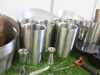 Lot of Assorted Bar Accessories to Include: 8 x Stainless Steel Ice Buckets, 8 x Stainless Steel Wine Coolers, 3 x Brass Wine Coolers, 1 x Copper Tray & Assorted Cocktail Accessories (As Viewed/pictured). - 8