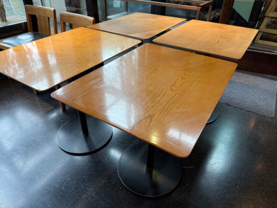 50 x Light Oak Dining Tables with Framed Bevel Edged Top on Heavy Black Metal Round Base. Size H74 x W60 x D80cm.