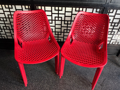 10 x Siesta Stacking Outdoor Air Chairs in Red.