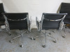 4 x Chrome Framed Black Stitched Faux Leather Swivel Chairs. - 4