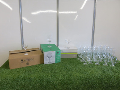 60 x Assorted Glassware to Include: 11 x Bouquet Wine Glasses, 19 x Utopia 6oz, 6 x Martini Glasses, 3 x Glass Coffee Mugs & 21 x Hurricane Cocktail Glasses