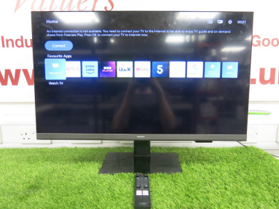 32" Philips Smart TV, Model 32PHS6808/05, Serial No FZ1A2313003390. Comes with Remote Control.