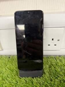 Samsung Galaxy AO3s Mobile Phone, Model SM-AO37G/DSN, 32GB, Dual Physical Sim. Comes with Charge & Sync Dock, Model LD-01. NOTE: phone unable to turn on for spares or repair.