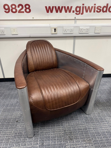 Timothy Oulton Aviator Tomcat Chairs in Brown Leather & Spitfire Design. Product Description from Website: Taking inspiration from the legendary British fighter plane, the innovative Aviator Tomcat is modelled on the twin cockpit chair of the American F-1
