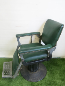La Reine Vintage Barbers Chair, Heavy Duty Cast Metal, Dark Green Vinyl Upholstery with Stud Detail. NOTE: requires restoration (As Viewed/Pictured).