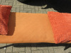 Pair of Benches Upholstered in Orange Quilted Fabric with Black Wooden Legs, Size H48 x W140 x D42cm. Comes with 4 x Orange Cushions. - 3