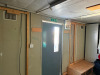 9.8m x 3m Jackleg Cabin with Seating & Lockers. NOTE: removal by appointment at end of clearance (Condition As Viewed & Inspected). - 5