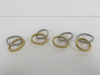 4 x L'OBJET Silver and Gold Napkin Rings.
