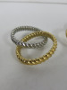 4 x L'OBJET Silver and Gold Napkin Rings. - 2
