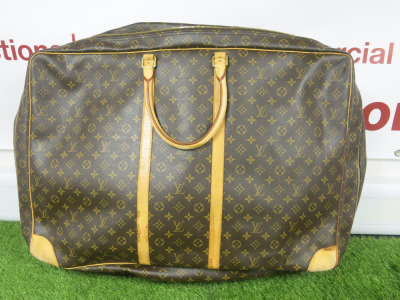 Louis Vuitton Brown Monogram 70 Travel Bag. Size H50cm, W70cm & D20cm. NOTE: condition as viewed/inspected.