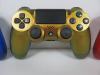 3 x Assorted SONY PS4 Pads to Include: 1 x Gold in Good Condition, 1 x Red in Good Condition & 1 x Blue with Slightly Sensitive X Button. - 2