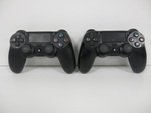2 x Standard Black SONY PS4 Pads.