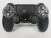 2 x Standard Black SONY PS4 Pads, NOTE: 1 x controller has slightly sensitive X button. - 4