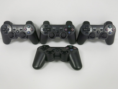 4 x New Black PS3 Pads.