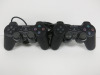 2 x Standard Black SONY PS2 Pads.