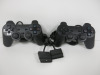 2 x Standard Black PS2 Pads.