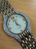 DMQ Swiss Movement Gold Tone Ladies Wrist Watch with Gemmed Bezel, Model DQ/N4074 in Oleg Cassini Box. NOTE appears unworn. - 3