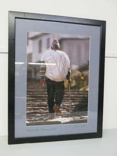Framed & Glazed Photograph by Jamie Williams of Elder Walking in Nepal. Size H64 x W50cm.
