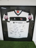 Bromley FC Football Shirt in Framed & Glazed Presentation Frame, for the 2013/14 Season, Signed by the Team. Size 85 x 98cm.