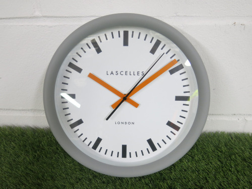 Lascelles Sync Grey Station Wall Clock with Orange Hands.