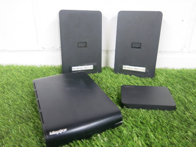 4 x External Hard Drives to Include: 2 x Western Digital (1.5TB), 1 x Maxtor (1TB) & 1 x Toshiba (1TB).