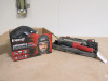 Powerbase Extreme Reciprocating Saw in Carry Case & Trend Airshield Pro Face Mask with Power Supply in Original Box.