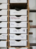 66 x Drawer Custom Made Accessory Parts Drawer Unit with Contents. Size 8' x 3'6". NOTE: missing 6 x draws (As Viewed). - 6