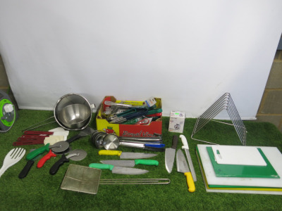 Quantity of Kitchen Utensils to Include: 6 x Spatulas, 2 x Scrapers,3 x Pizza Cutters, 7 x Ladles, 2 x Sieves, 29 x Assorted Sized Tongs, 1 x Salter Dietary Kitchen Scales, 6 x Kitchen Knives & 1 x Metal Chopping Board Holder & 5 x Assorted Chopping Board