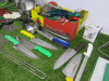 Quantity of Kitchen Utensils to Include: 6 x Spatulas, 2 x Scrapers,3 x Pizza Cutters, 7 x Ladles, 2 x Sieves, 29 x Assorted Sized Tongs, 1 x Salter Dietary Kitchen Scales, 6 x Kitchen Knives & 1 x Metal Chopping Board Holder & 5 x Assorted Chopping Board - 8
