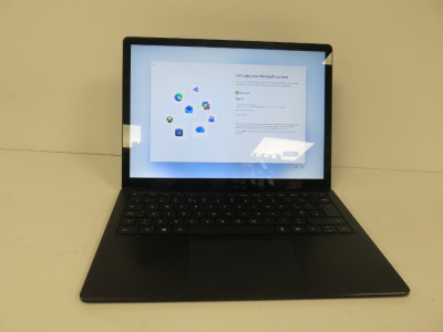 Microsoft 13.5" Laptop, Model 1868. Comes with Power Supply. NOTE: crack to screen.
