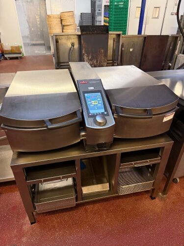 Frima Vario Cooking Center, Model VCC 112L, S/N E13J17098029816, 3 Phase, Year 2021. Comes on Stainless Steel Prep Unit with Pull-Out Shelf & 2 x Baskets, Size H65 x W110 x D82cm.
