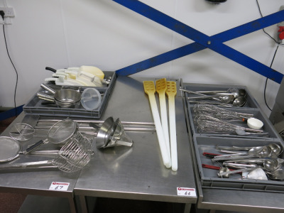 Large Assortment of Approx 60 x Commercial Kitchen Utensils to Include: Sieves, Scoops, Ladles, Paddles, Whisks Etc (As Viewed).