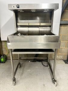 Commercial Stainless Steel Chip Dump, DOM 11/21. Size H75 x W90 x D79cm. Comes with Stainless Steel Table, Size H84 x W89 x D68cm.NOTE: castors need attention.