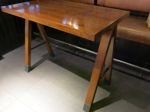 Dark Wood High Varnished Table with Metal Feet Caps. Size H90 x W110 x D65cm.