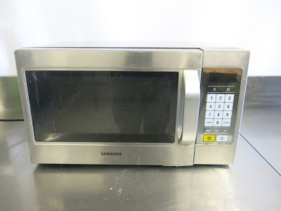 Samsung 1100w Microwave, Model CM1089, S/N 800229N. NOTE: unable to power up for spares or repair.