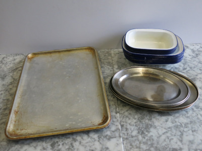 30 x Pie Dishes & Serving Dishes to Include: 18 x Assorted Sized Enamel Pie Dishes, 9 x Oval Metal Dishes & 3 x Metal Trays.