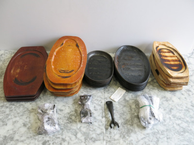 14 x Assorted Sized Cast Iron Sizzling Plates with 16 x Assorted Sized Wooden Platters.
