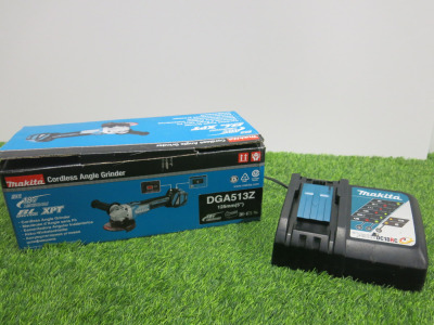 Boxed/New Makita 5"Cordless Angle Grinder, Model DGA513, 18v. Comes with Makita DC18RC Single Charger. NOTE: batteries required.