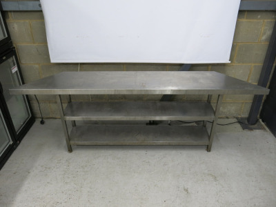 Stainless Steel Table with 2 Shelves Under. Size H73cm x W140cm-210cm x D35cm. NOTE: missing foot.