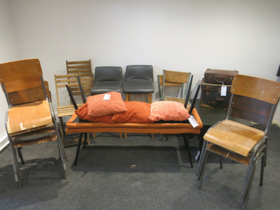 Large Lot of Furniture Consisting of: 8 x Green Velour Rub Chairs, 11 x Assorted Style Stalls, 21 x Assorted Chairs, 2 x Orange Fabric Benches with 4 Cushions, 2 Vintage Trunks, 2 x Bed Side Tables, Black 2 Drawer Unit & Coffee Table.