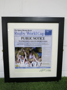 Signed Newspaper Cut Out of England Rugby Celebrates Webb Ellis Cup, Signature Unknown. Framed & Glazed. Size 50 x 45cm.
