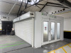 Todd Engineering Spartan 2000 Series Gas Spray Booth, Size 7.5 x 4.0M. 3 Bi-Fold Front Entrance with Shutter Door Side Access. Hours Run 5711, Last Serviced 25/11/25. Comes with 43" Hisense TV. NOTE: Buyer will be required to supply RAMS for dismantling &