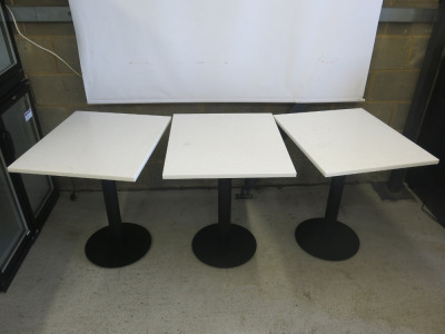 21 x Restaurant/Caf&eacute; Tables with White Marble Tops & Heavy Black Single Pedestal Bases to Include: 1 x H75 x W100 x D70cm & 20 x H75 x W70 x D60cm.