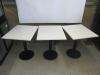 21 x Restaurant/Caf&eacute; Tables with White Marble Tops & Heavy Black Single Pedestal Bases to Include: 1 x H75 x W100 x D70cm & 20 x H75 x W70 x D60cm.