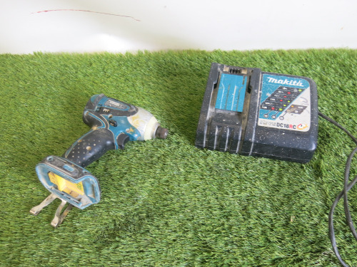 Makita BTD141 Cordless Impact Driver, with Battery Charger. NOTE: requires battery.